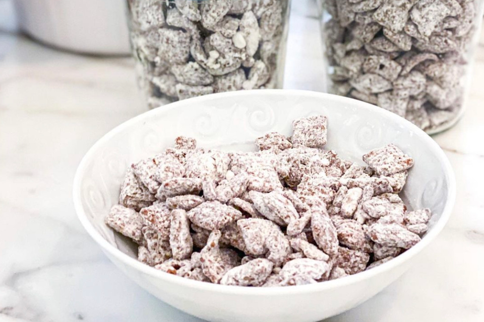 puppy chow snack in a white bowl